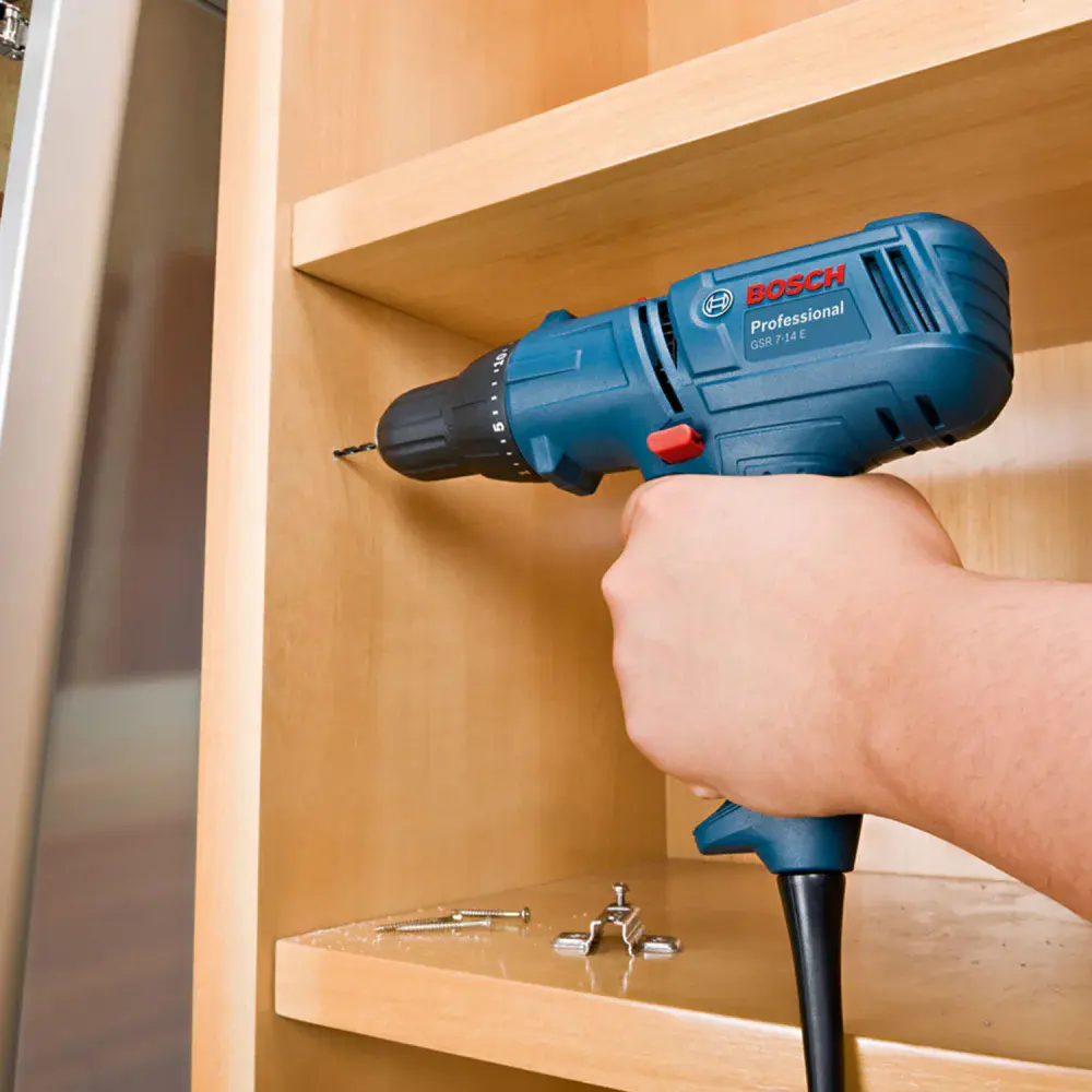 Parafusadeira furadeira GSR7-14E 220V + 21 bit Bosch — fotografia 3